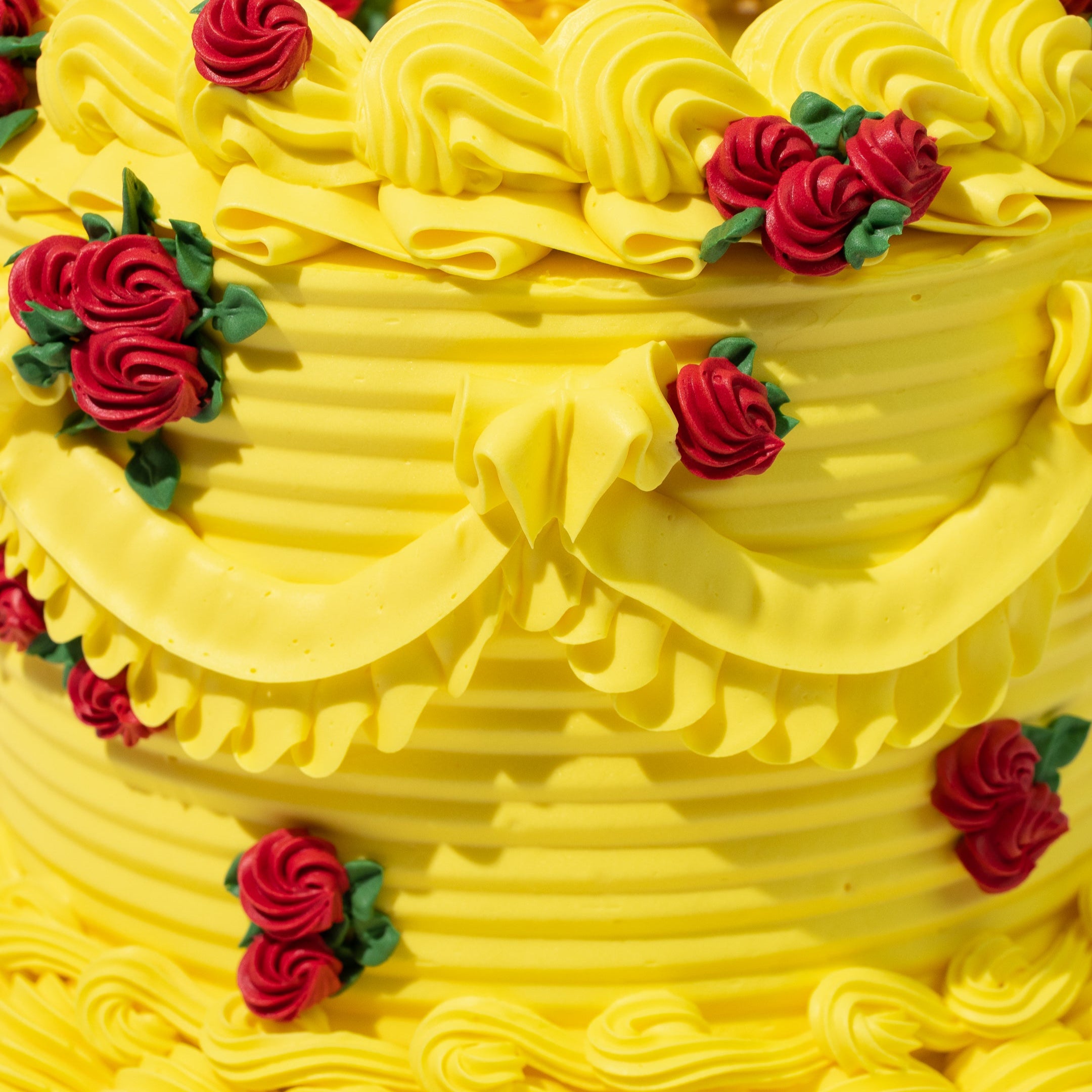 Luxury Disney Princess Belle-inspired cake. Belle figurine topper. Beauty and the Beast theme.