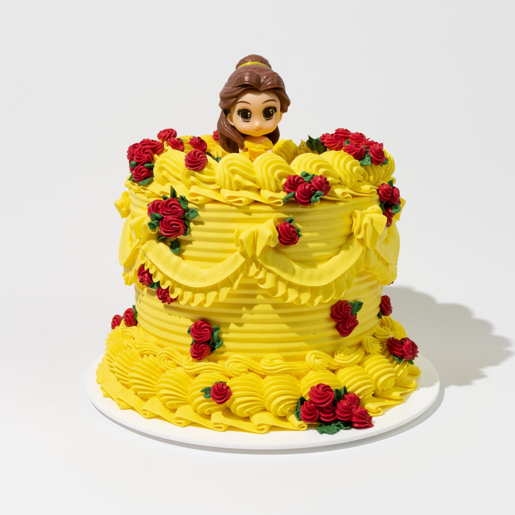 Luxury Disney Princess Belle-inspired cake. Belle figurine topper. Beauty and the Beast theme.